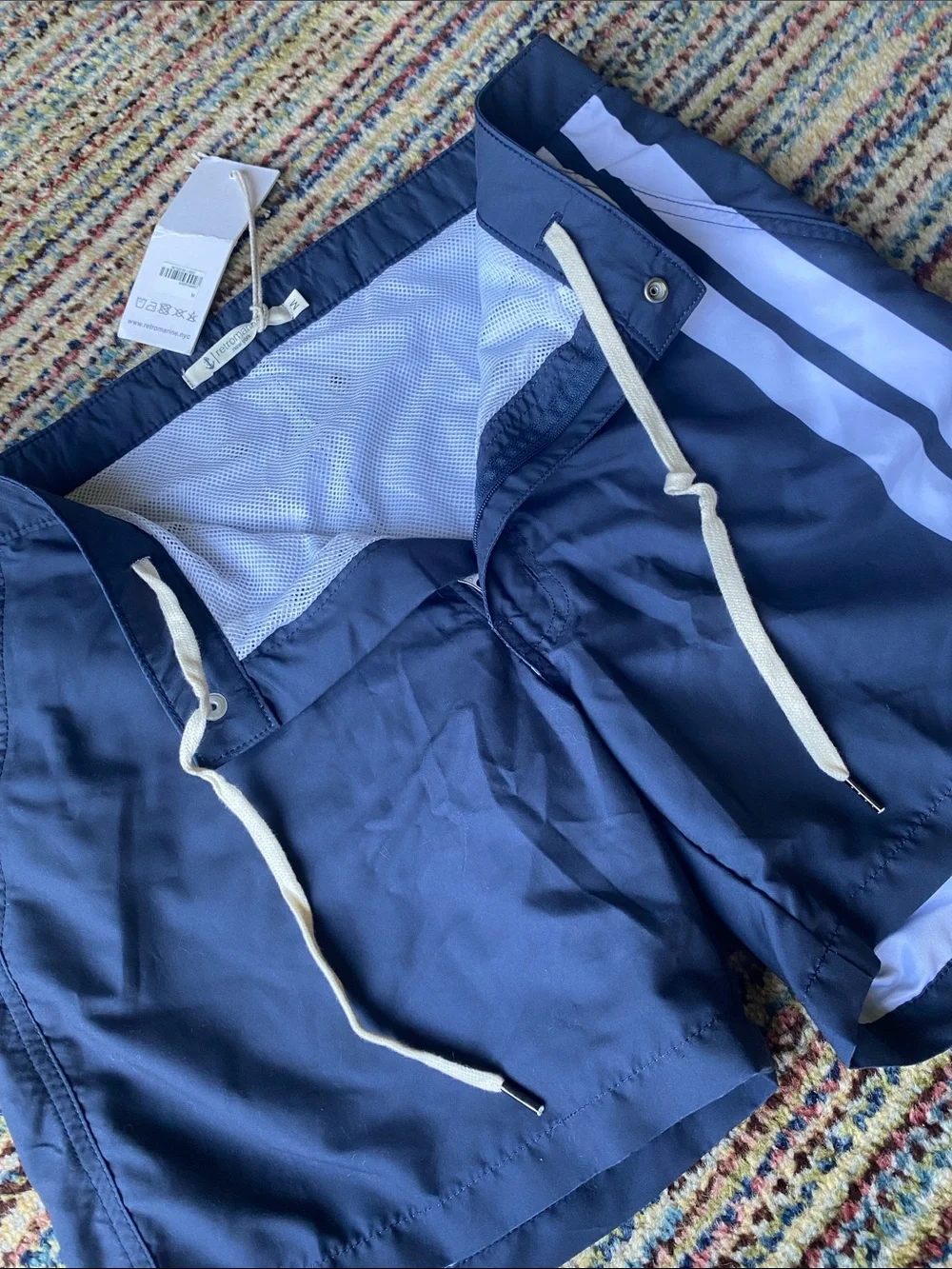Retromarine navy swim trunks with white stripes